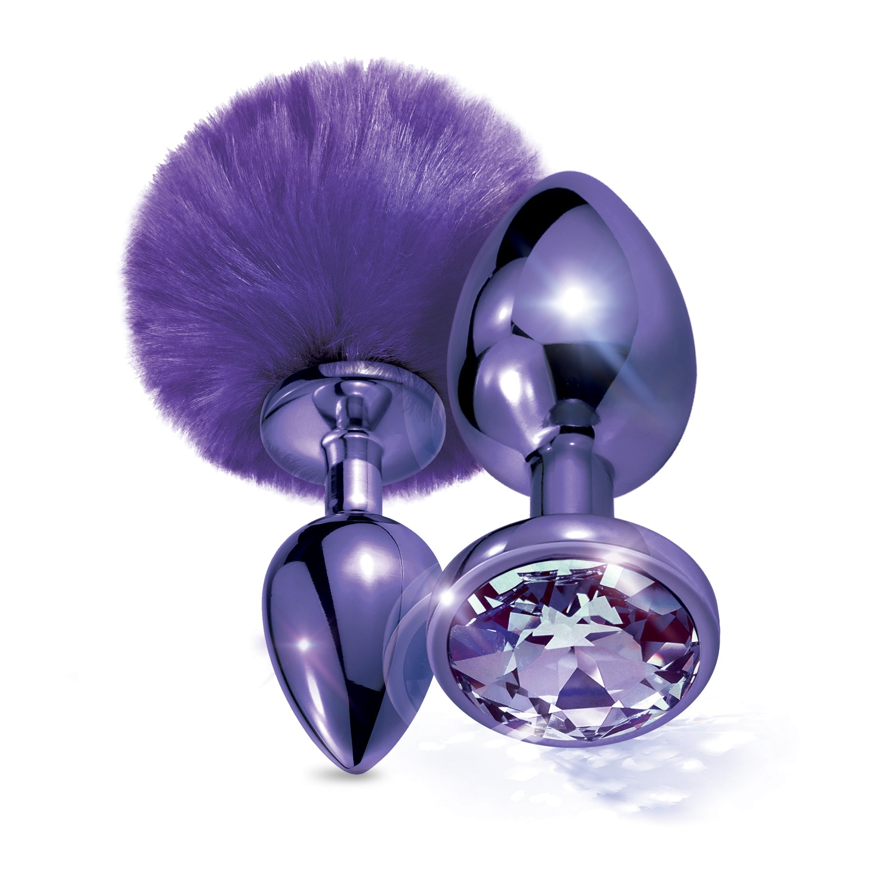 NIXIE Metal Butt Plug Set, Pom Pom and Jewel Inlaid, Purple Metallic Global Novelties LLC NIXIE Metal Butt Plug Set, Pom Pom and Jewel Inlaid, Purple Metallic Global Novelties LLC